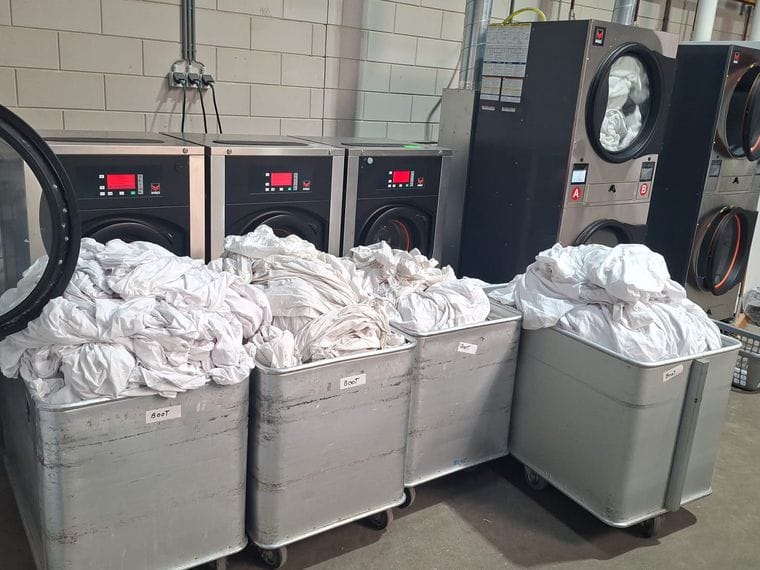 Onze professionele wasmachines en sorteerbakken